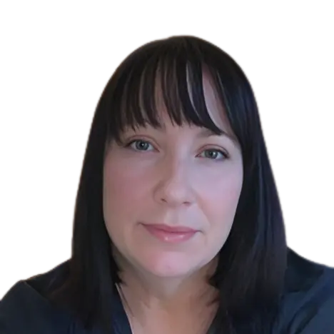 Close-up portrait of a woman with dark hair and bangs, wearing a dark top.